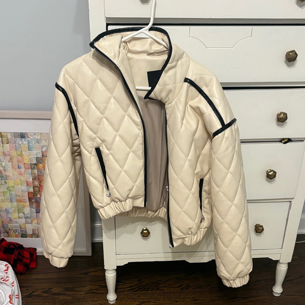 Quilted Cream Puffer Jacket with Black Trim
